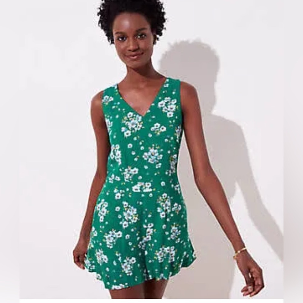 New with tags LOFT Floral V Neck Romper size 12p green color with blue flowers